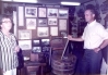 Gladys Stern and Bill Collar Examine Pictures in Depot Museum 1976